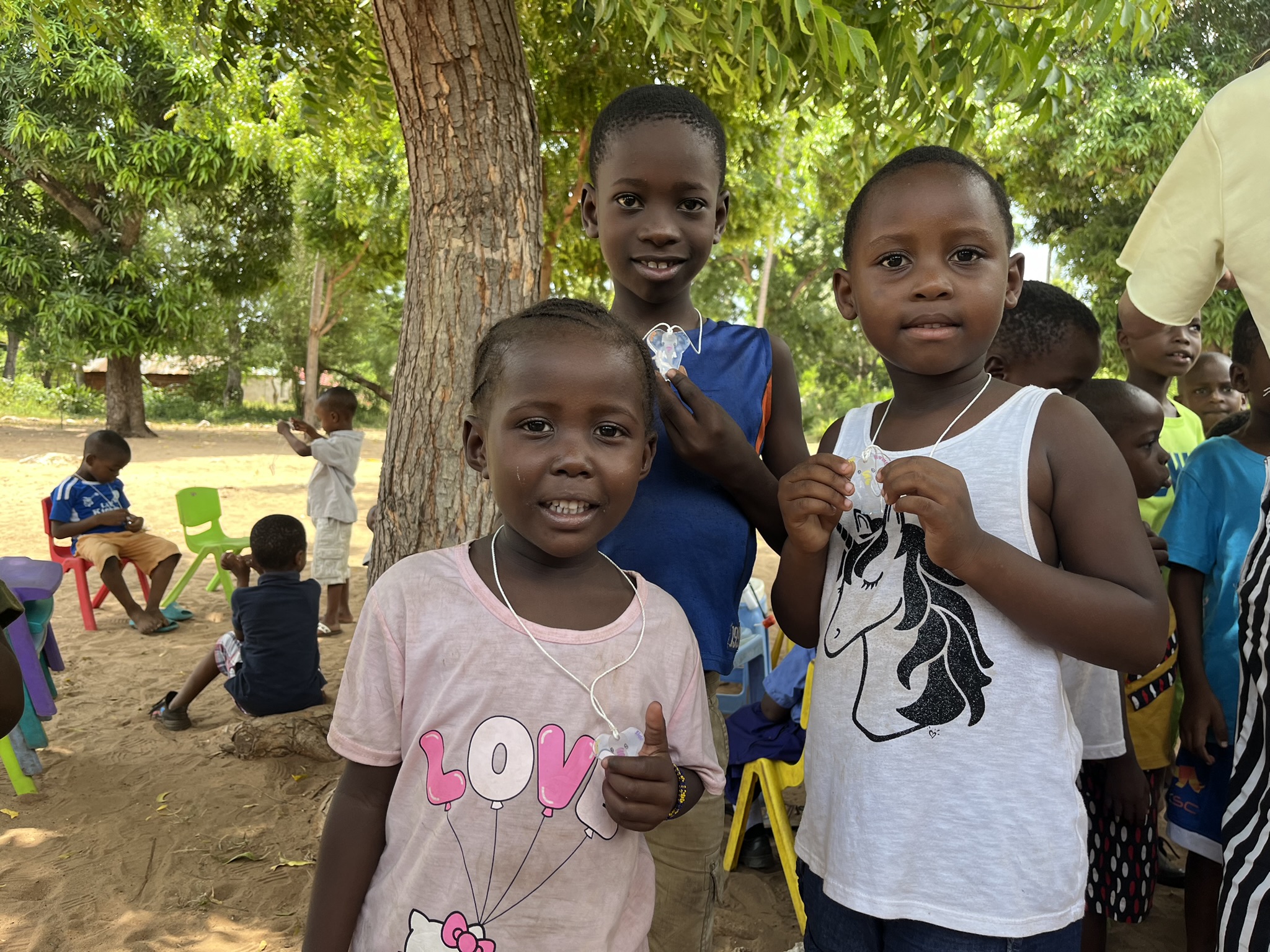 Kids with elephant necklaces